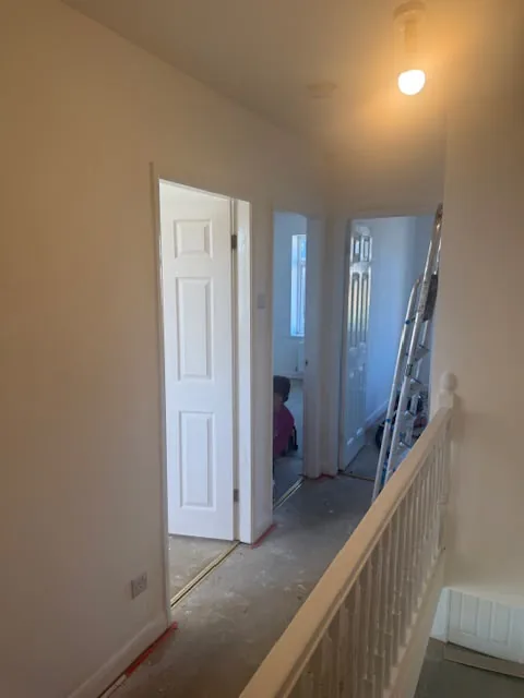 Upstairs landing with new white panel doors